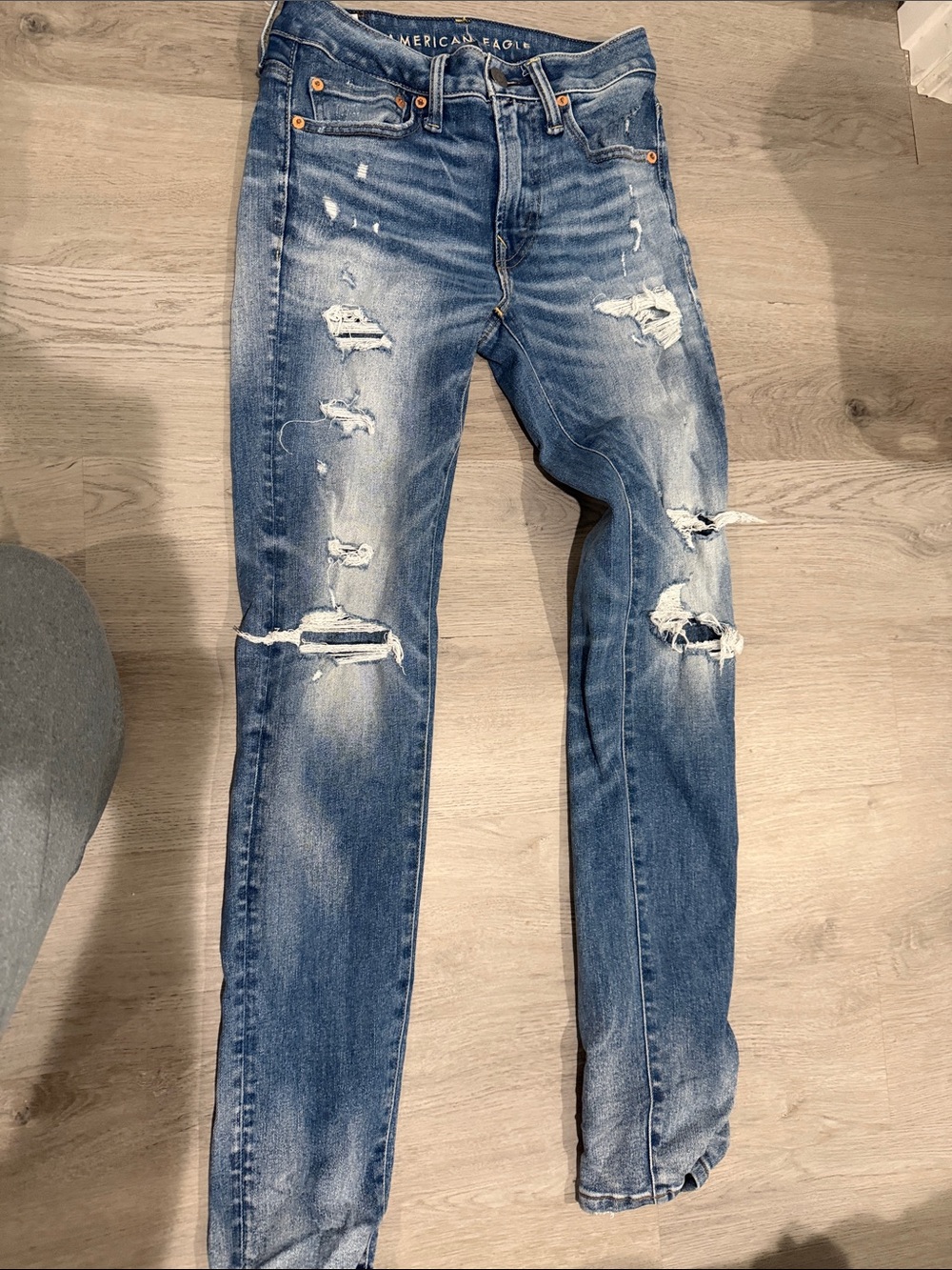 American Eagle Outfitters Men’s Ripped Washed Blue Skinny Jeans